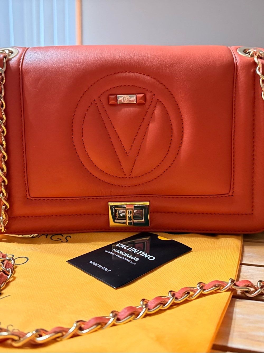 Valentino Garavani Orange Leather Crossbody Bag with Gold Chain